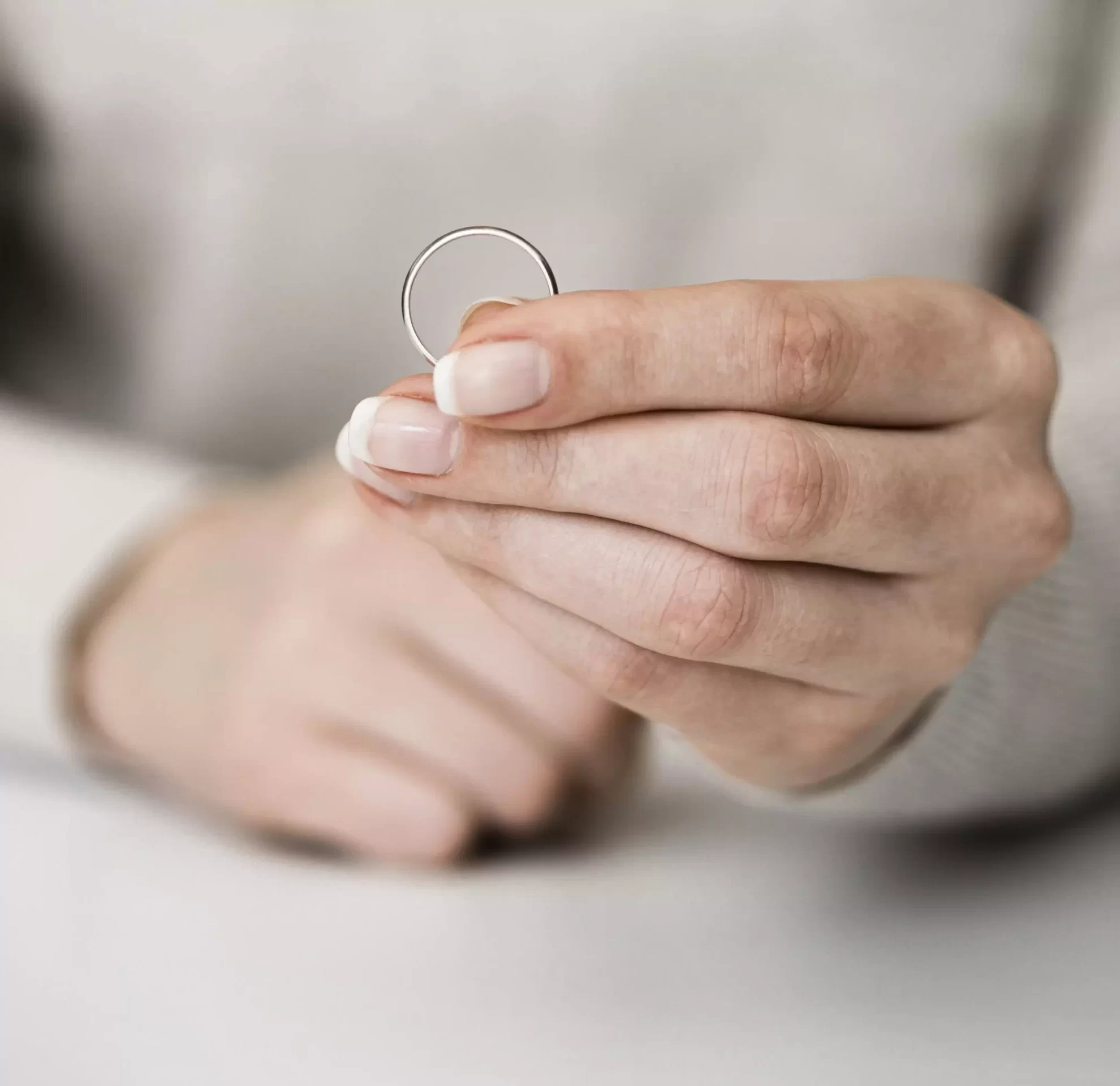 AnyConv.com__woman-holding-marriage-ring